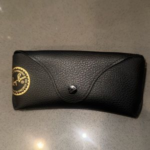 Black Ray-Ban sunglasses case with microfiber cleaning cloth.